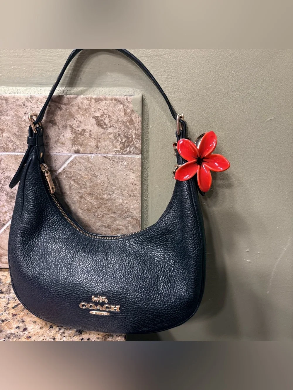 Coach Black Pebbled Leather Shoulder Bag with Red Flower Charm